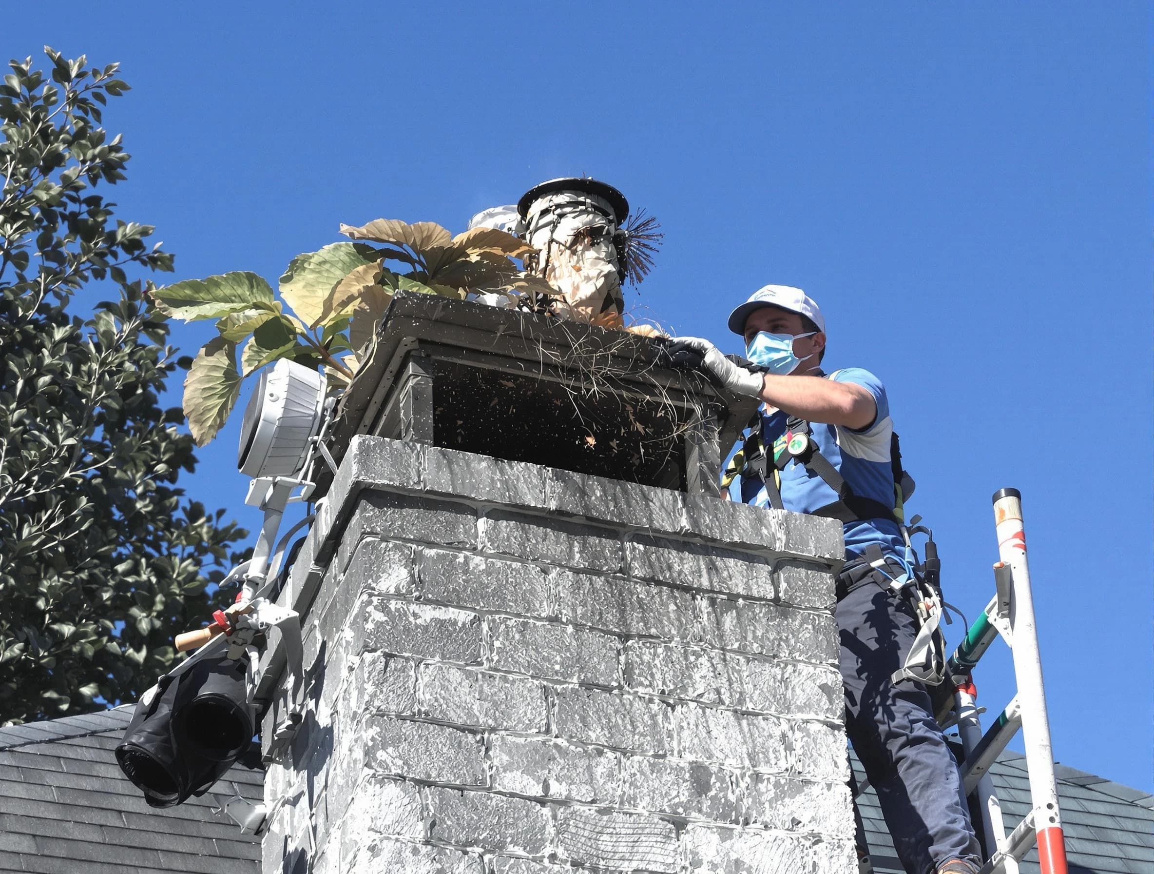 New Brunswick Chimney Sweep specialist performing chimney cleaning in New Brunswick, NJ