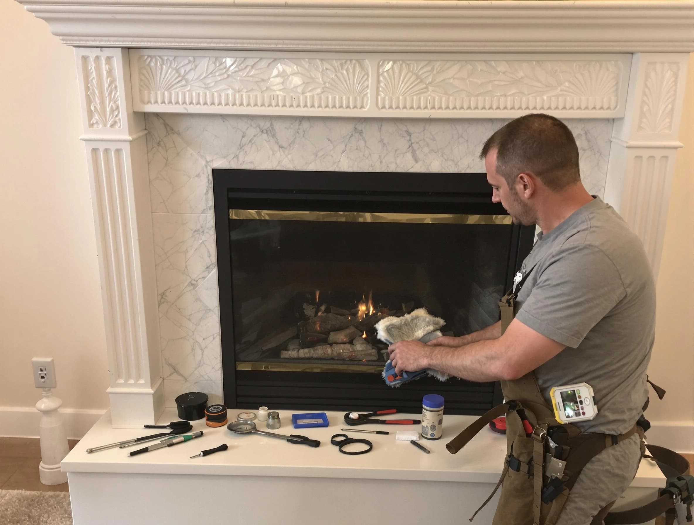 New Brunswick Chimney Sweep performing fireplace maintenance in New Brunswick, NJ